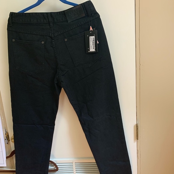 Men’s Skinny fit rigid jeans with extremes rips - Picture 2 of 2